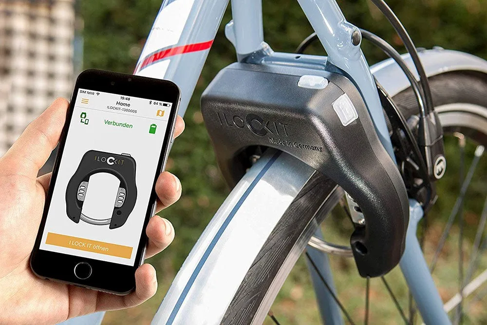 E-Bike Schloss am Reifen und Handy mit GPS-App – Sicherheit und Schutz für dein E-Bike im Rahmen einer E-Bike Versicherung.
